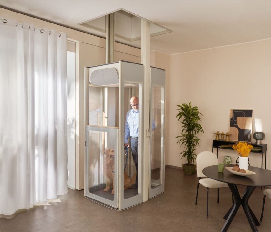 Senior man and his dog on the Uplifts S3 homelift