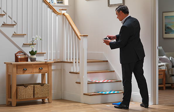 Man taking pictures of stairs